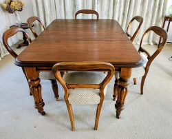 Victorian-style dining table and chairs